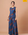 Sleeveless button-down vest coat with front slit in indigo cotton